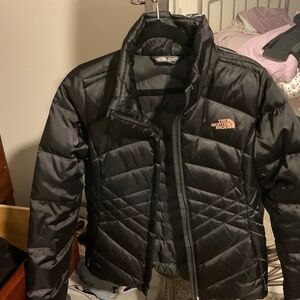Woman’s north face down jacket size medium